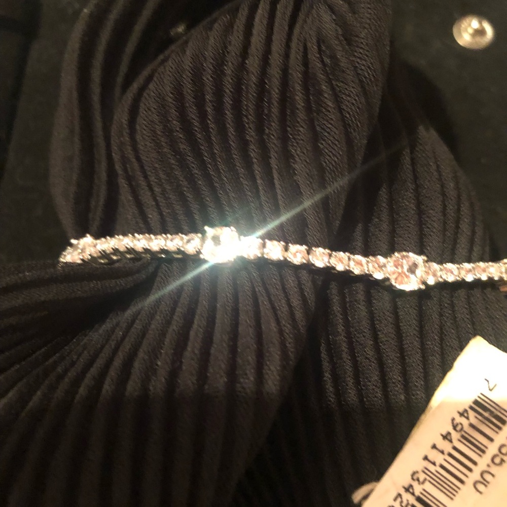 NWT Bloomingdales 925 Sterling Silver/ platinum plated and CZ tennis bracelet.